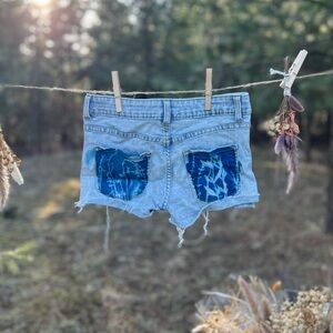Blue Denim Shorts with Distressed Details